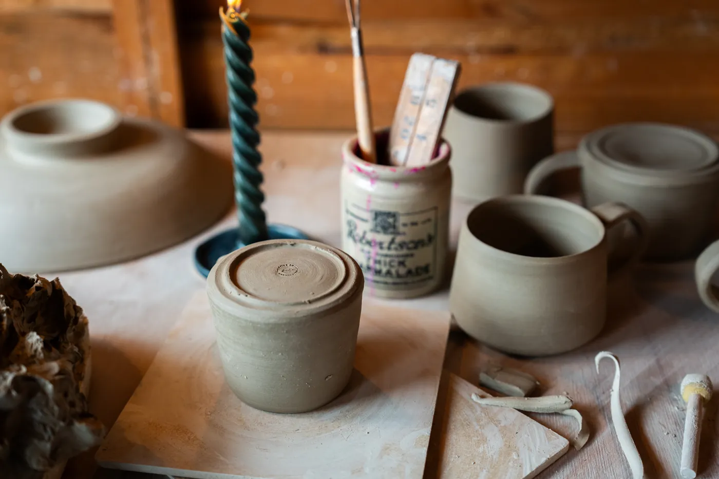 Isa’s own pots and mugs on the studio workbench